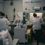 Dr Sahsa Soldati and Dr Fravia Giamogante are preparing HC116 colorectal cancer cell cultures in Peptone's BSL2 labs.
